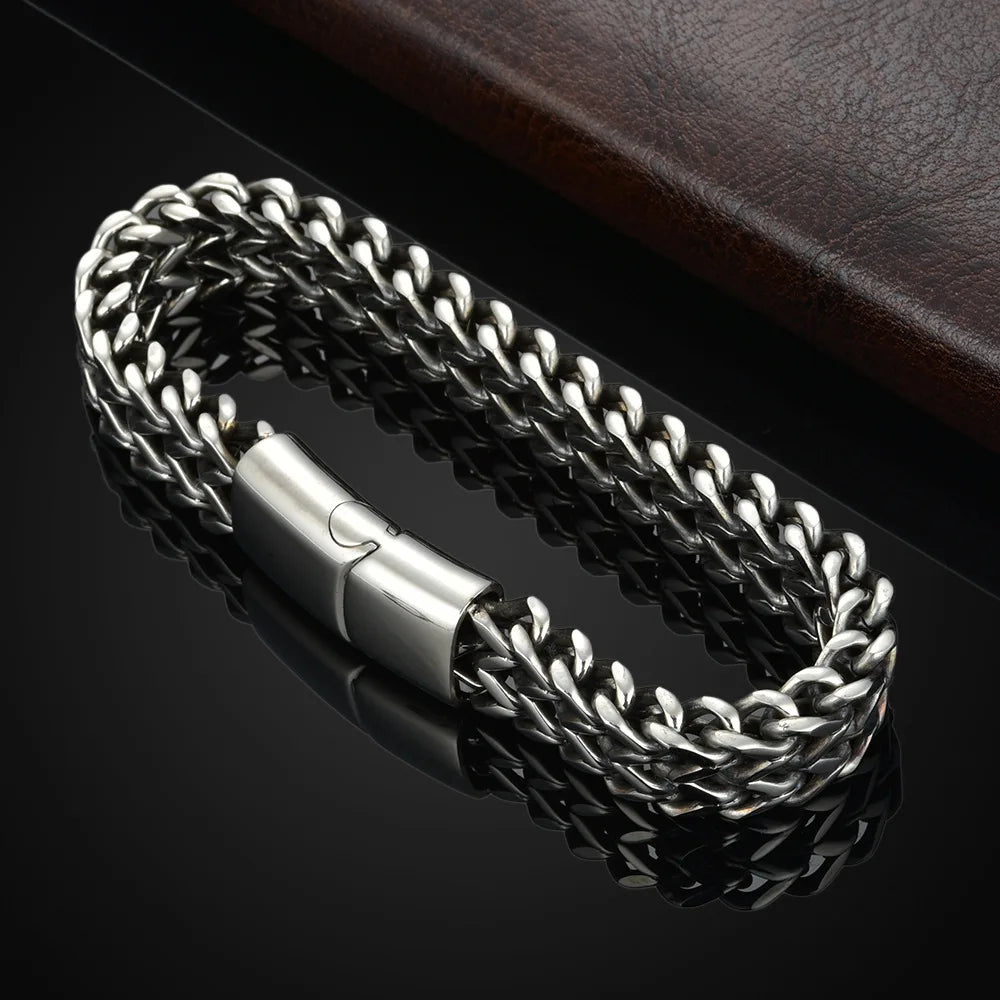 Braided stainless steel bracelet worn on wrist