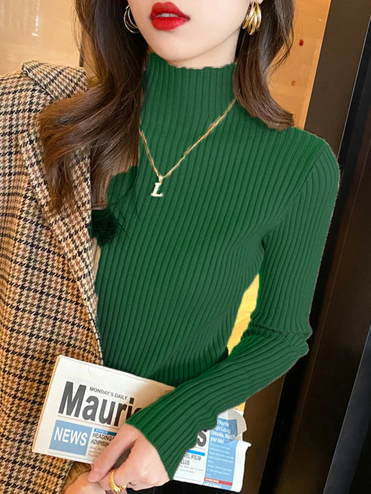 Slim turtleneck sweater green worn close up