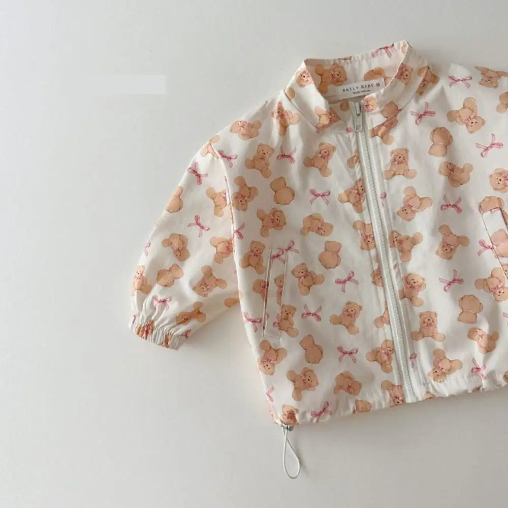 Baby cartoon print sun jacket worn by child