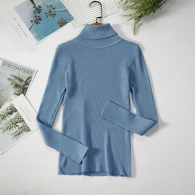 Soft turtleneck sweater front view powder blue