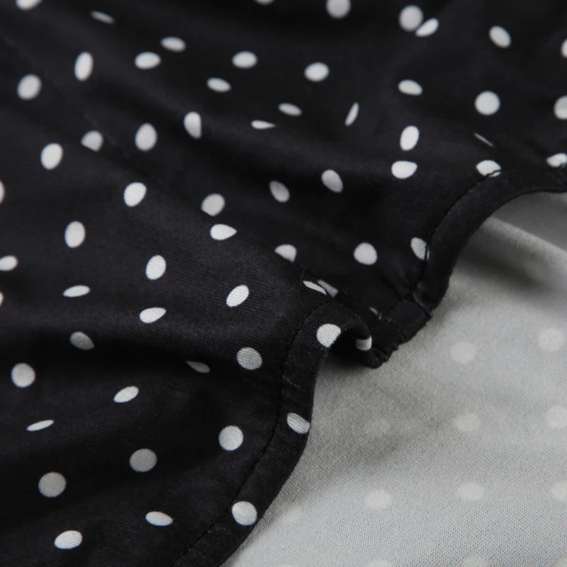 Polka dot halter dress styled for vacation