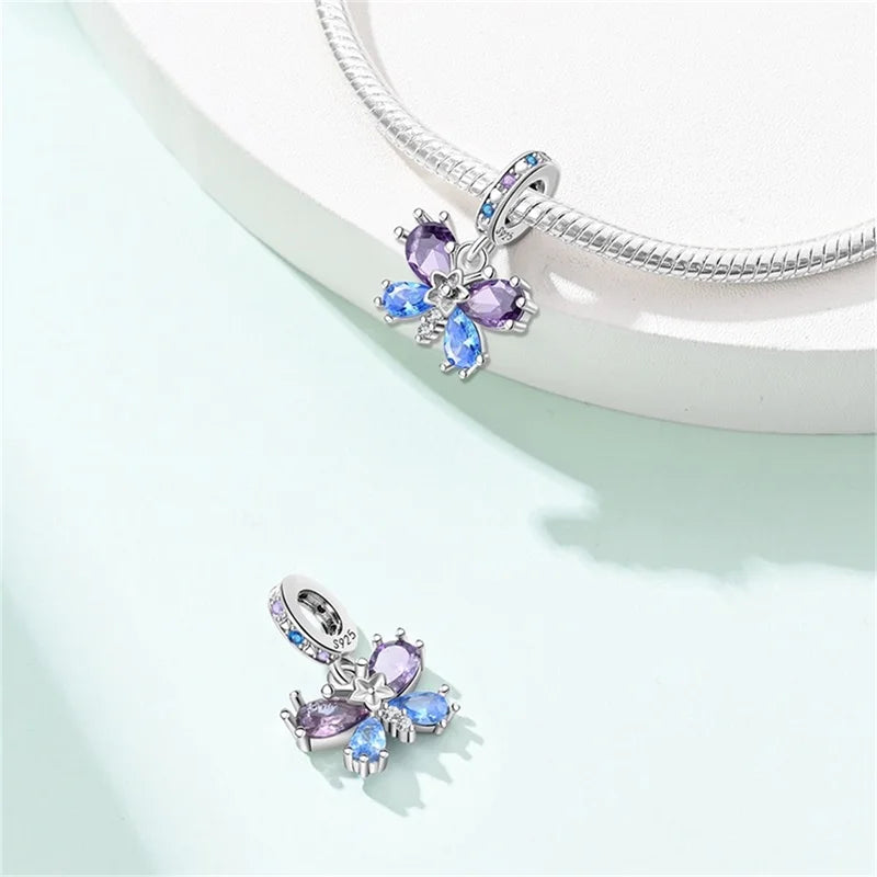 Butterfly charm beads attached to bracelet