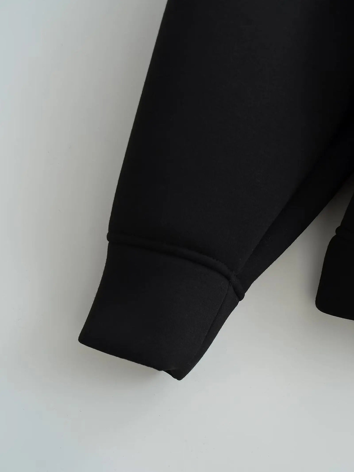 Women's zip-up hoodie jacket front view black