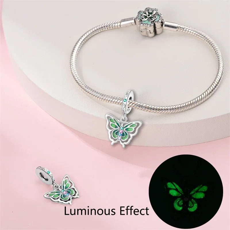 Butterfly charm beads attached to bracelet