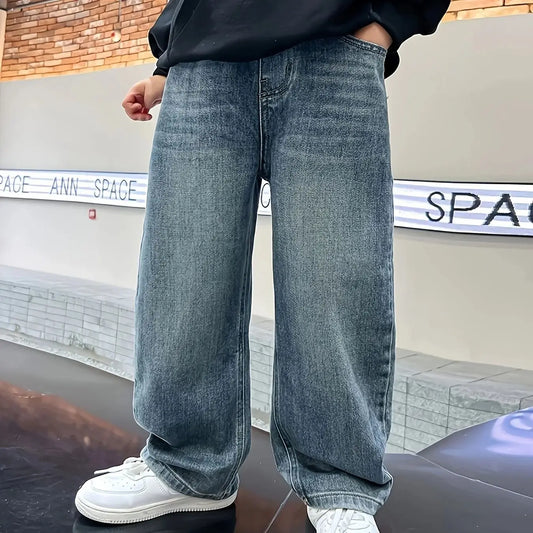 Boys loose fit jeans worn by child