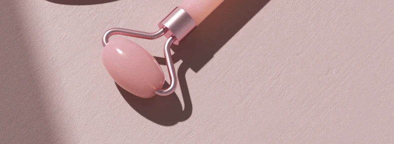 Facial massage roller scraper set worn in use
