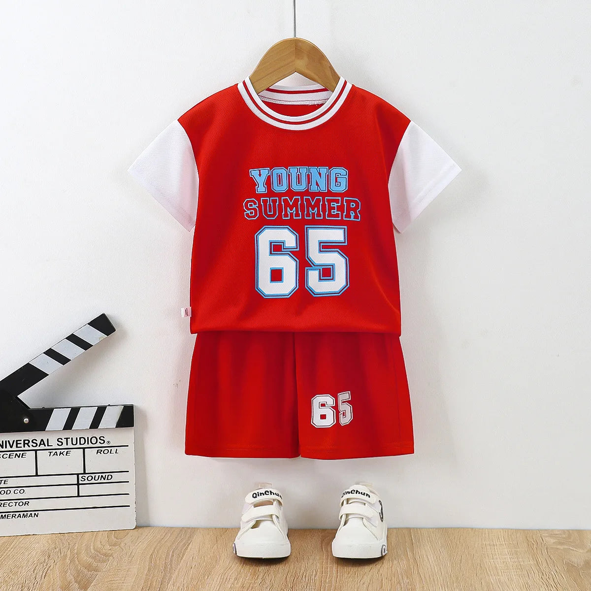Boys basketball tee & shorts set worn by child