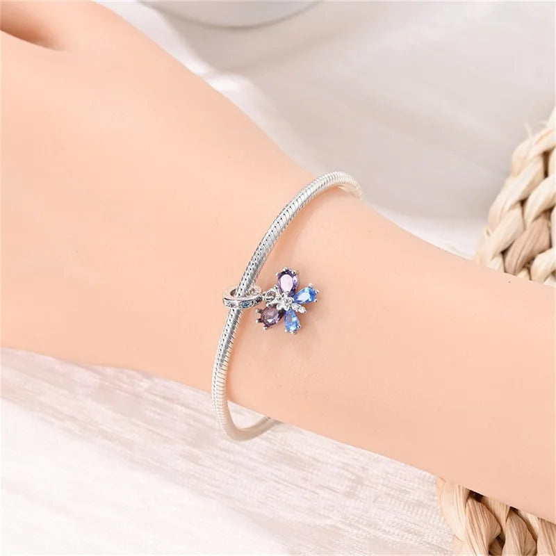 Butterfly charm beads attached to bracelet