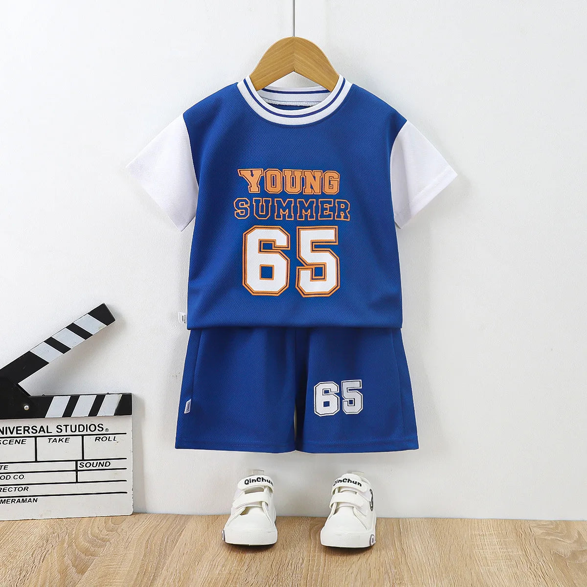 Boys basketball tee & shorts set worn by child