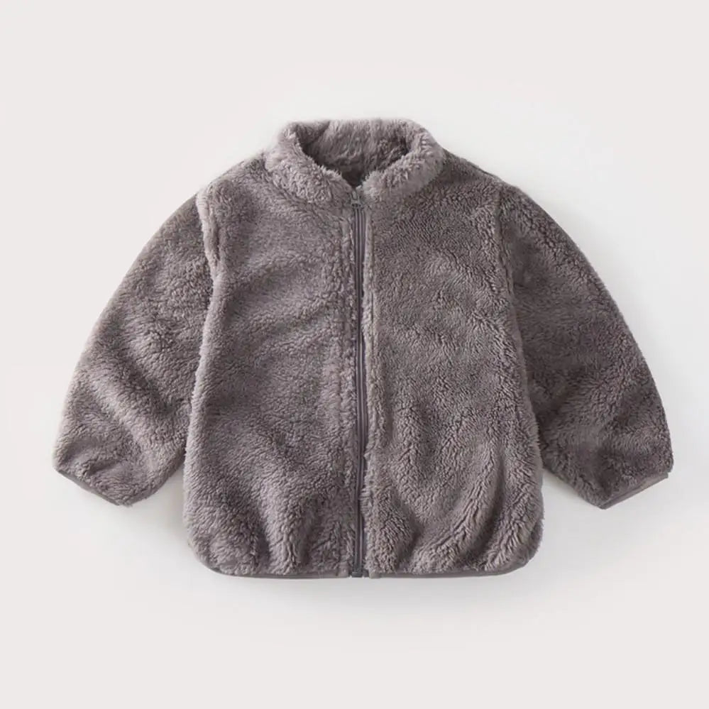 Kids plush winter coat lining texture closeup