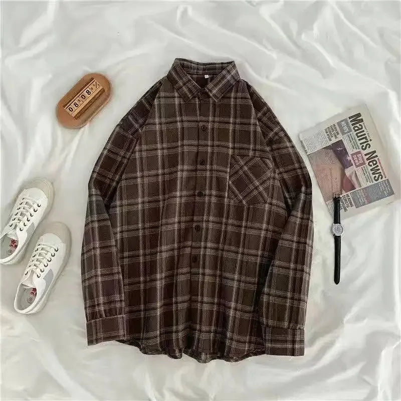 Oversized plaid shirt brown texture close up detail
