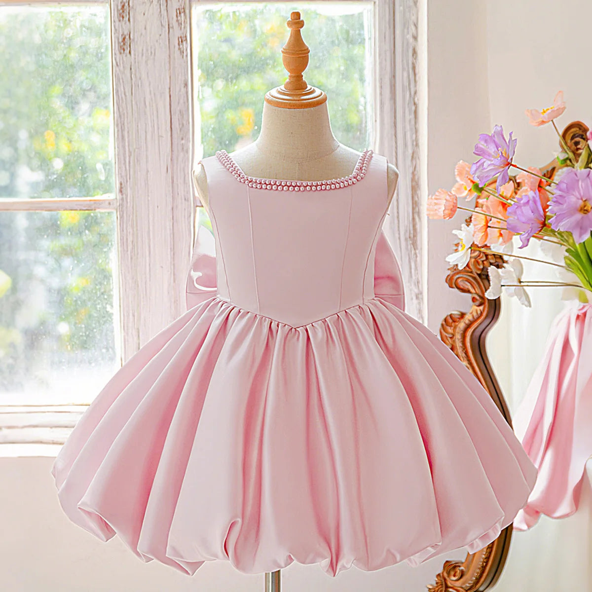Girls bow tutu party dress worn by child