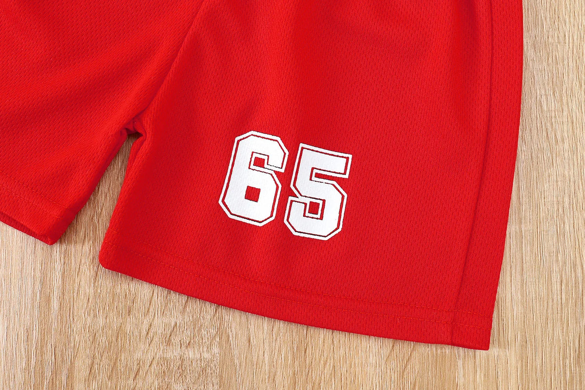 Boys basketball tee & shorts set worn by child