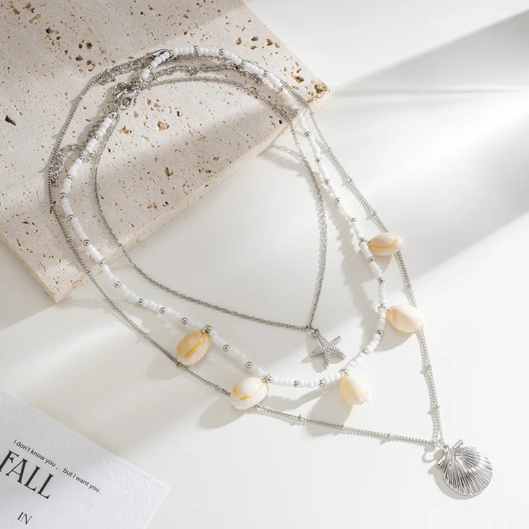 Pearl shell starfish necklace pendant close-up