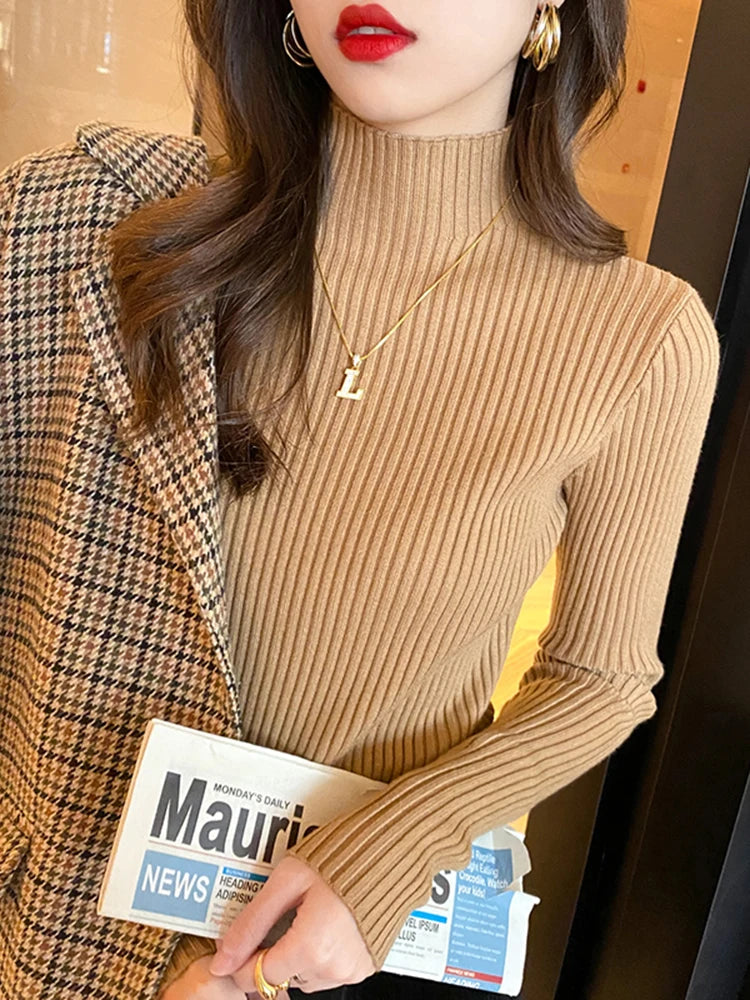 Slim turtleneck sweater beige close up neckline
