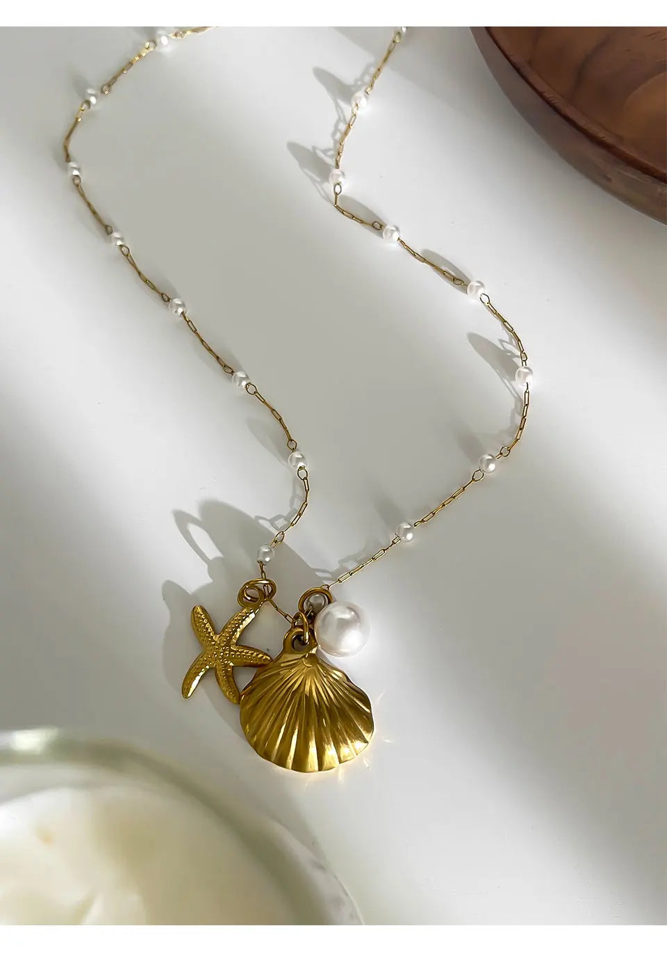 Pearl starfish shell necklace full view gold