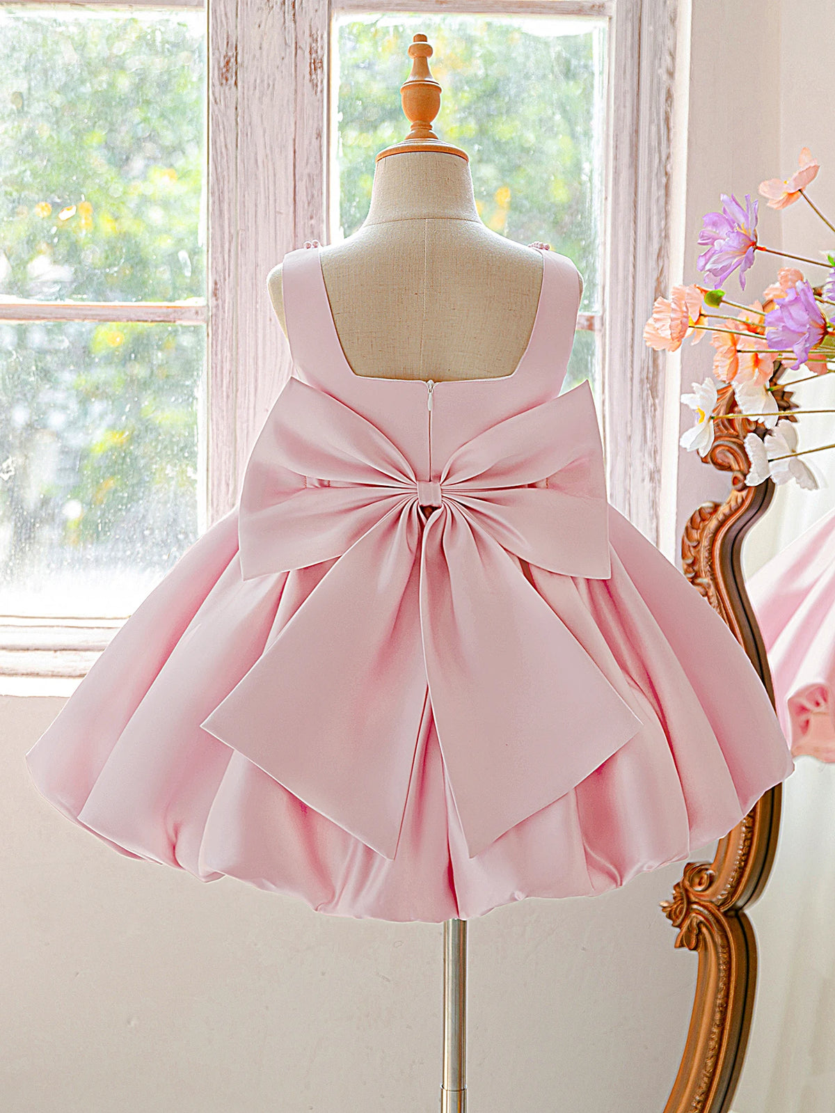 Girls bow tutu party dress worn by child