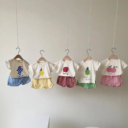 Baby sleeveless pajama set worn on baby