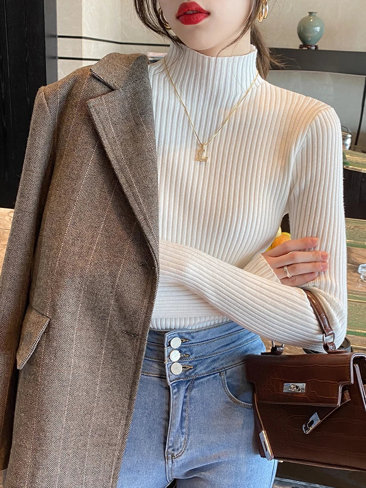 Slim turtleneck sweater beige worn full body