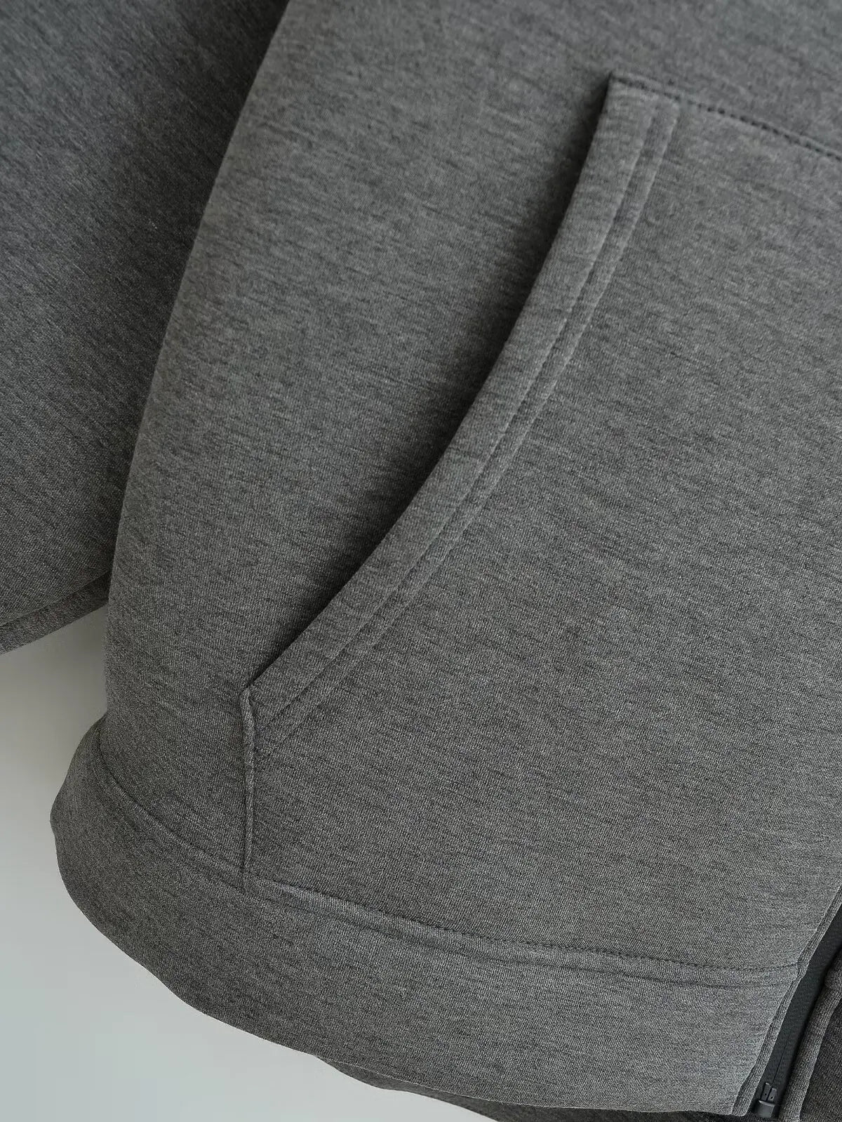 Women's zip-up hoodie jacket front view dark grey