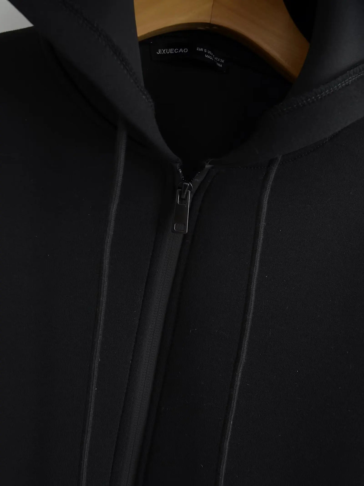 Women's zip-up hoodie jacket front view dark grey
