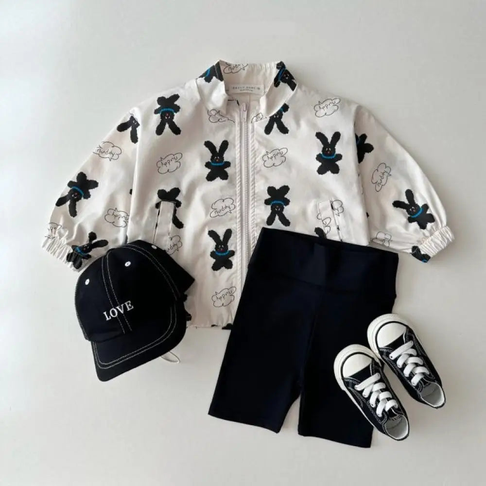 Baby cartoon print sun jacket worn by child