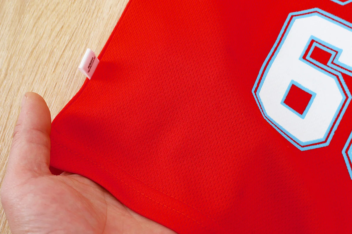 Boys basketball tee & shorts set worn by child